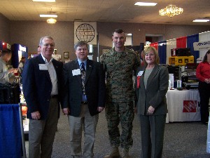 The new 2007 chapter officers gather at the chapter's January conference and exhibition. From l-r: Brad Moses, membership vice president (VP); Dan Egge, programs VP; Sweeney and Joyce Moses, program support.